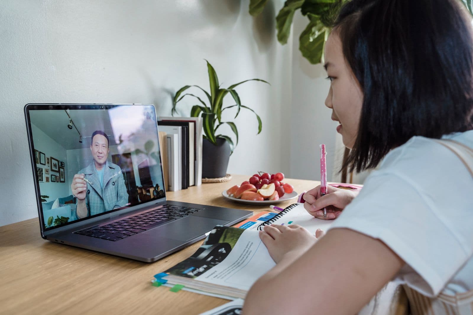 Student studying online with a laptop during a virtual learning session