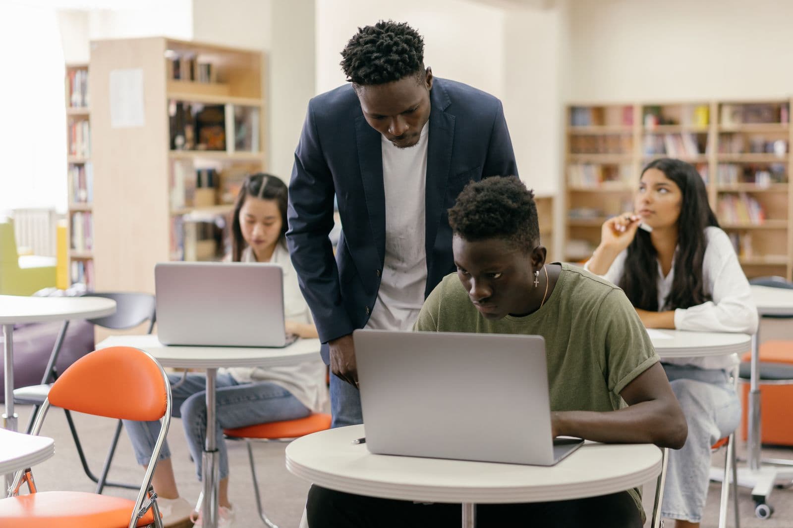 Diverse students attending class together in a contemporary school setting